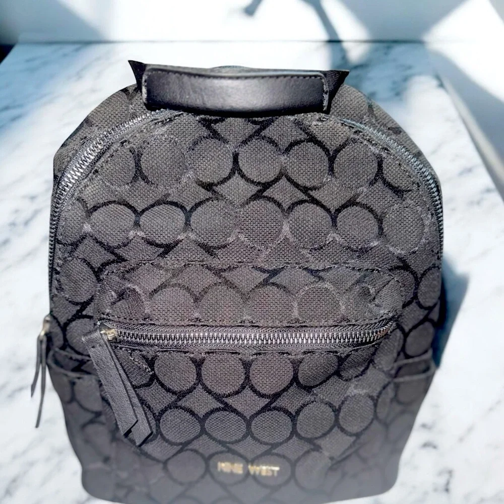 Chic & Compact: Nine West Taren Mini backpack Black logo canvas & leather